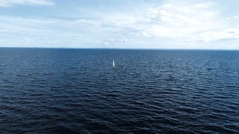 Sailboat On A Calm Lake Aerial View Stock Footage