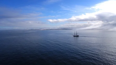 Sailboat With Cloud Backdrop by Aerial Drone Stock Footage 87516982