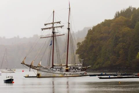 Sailboat on Cloudy Day Stock Photos