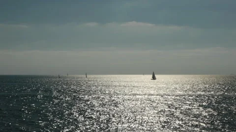 Sailboat in distance on ocean #1 Stock Footage 46267600