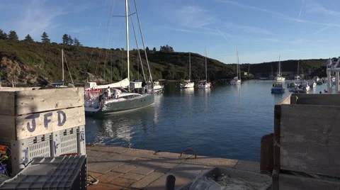 Sailboat entering a harbor Stock Footage 61541721