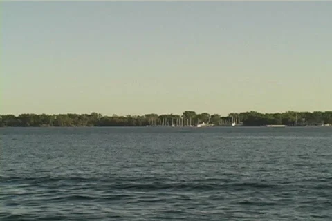 Sailboat floats across Stock Footage