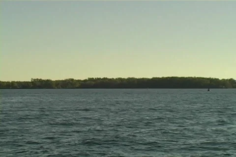 Sailboat floats across Stock Footage