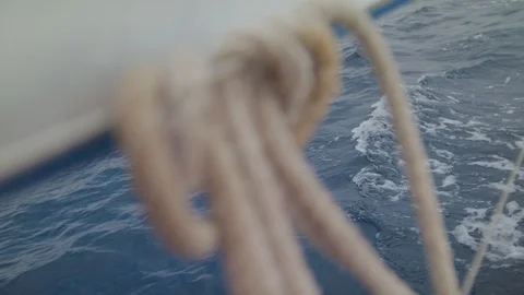 Sailboat glides to meet the Wind Sail Yacht moving on calm waves of the ocean Stock Footage 113395997