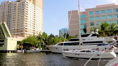 Sailboat goes under draw bridge Stock Footage 80682503