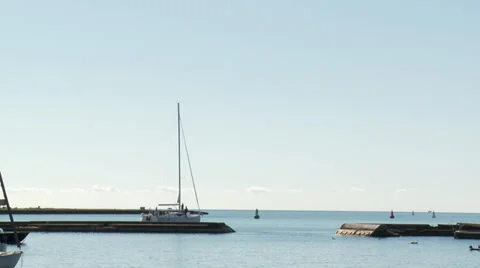 Sailboat heading out to the Lake Stock Footage 31812423
