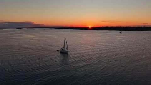 Sailboat in a lake during sunset Stock-Footage 342607368