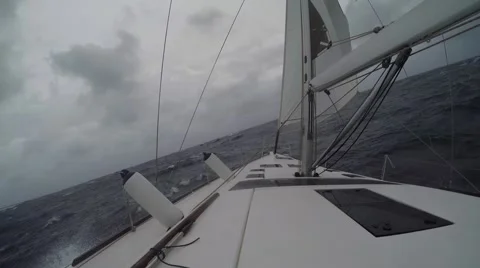 Sailboat moving through storm Video stock 67667758
