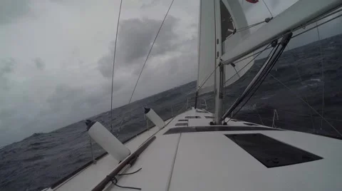 Sailboat moving through storm Video stock 67668187
