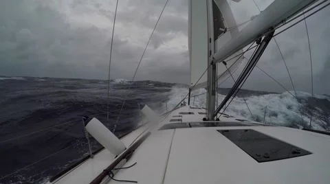 Sailboat moving through storm Video stock 67668565