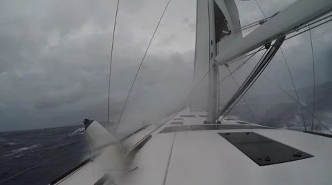Sailboat moving through storm Video stock 67668609