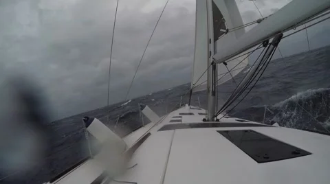 Sailboat moving through storm Video stock 67668902