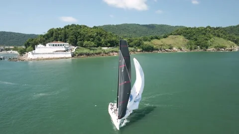 Sailboat navigating with open sails  in the ocean. Summer activities. Stock Footage 171633867
