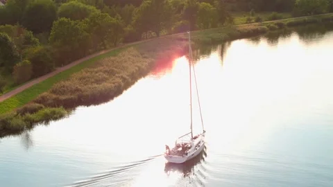 Sailboat on a nice summer evening Stock Footage