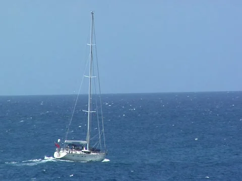 Sailboat to ocean CROSSES SCREEN Stock Footage 709196