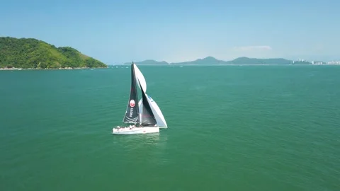 Sailboat Orbiting a competion in the ocean Stock Footage 171634094