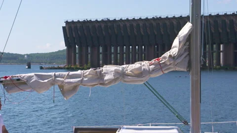 A sailboat by an ore dock Stock Footage 145007987