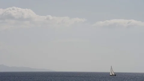 Sailboat passes Stock Footage 79684692