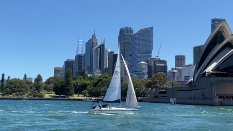 Sailboat passing in front of Sydney Opera House, Australia Stock Footage 231037724