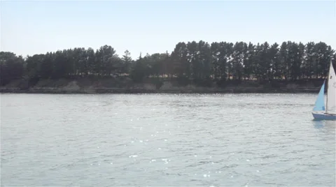 Sailboat passing near the camera Stock Footage 27452001