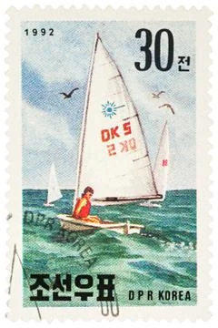 Sailboat on postage stamp Stock Photos