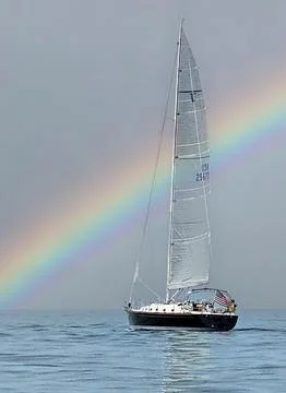 Sailboat With Rainbow Stock Photos