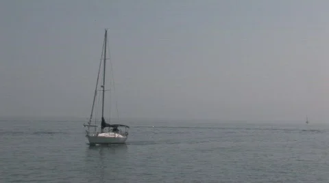 Sailboat Returning to a Harbor Stock Footage 734908