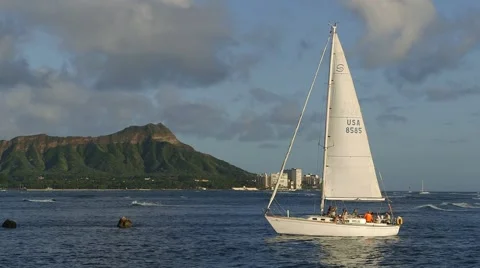 Sailboat Returns to Harbor Ala Moana Park, Waikiki, Hawaii Stock Footage 56174183
