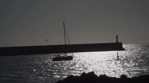 Sailboat sailing in sunset Stock Footage 145813373