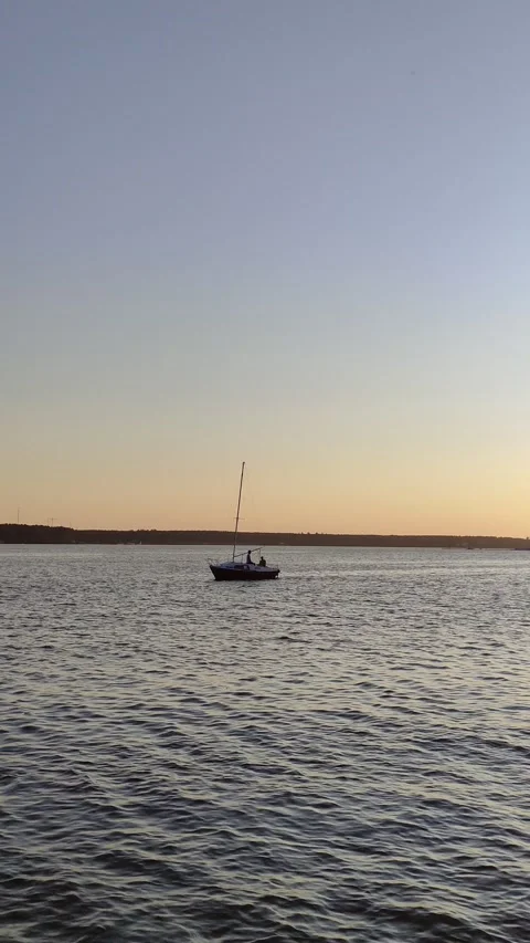 Sailboat on the sea at sunset Stock Footage 314158476