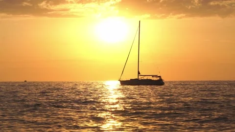 Sailboat at sunset Stock Footage 247352153
