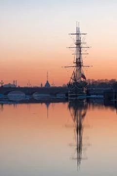 Sailboat at sunset. Stock Photos