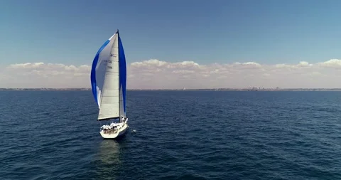 Sailboat under white sails at the regatta. Sailing yacht race. Stock Footage 155397270