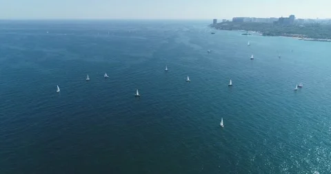 Sailboat under white sails at the regatta. Sailing yacht race. Stock Footage 155408874