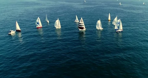 Sailboat under white sails at the regatta. Sailing yacht race. Stock Footage 155409158