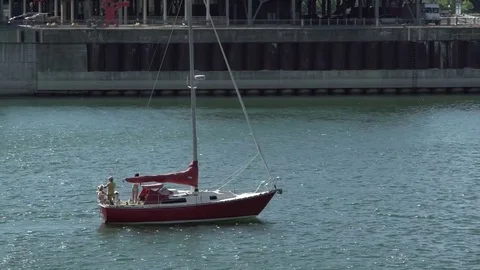 Sailboat Using Motor on  St. Lawrence River Stock Footage 77164954