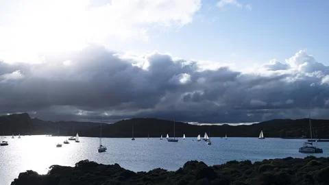 Sailboats and dramatic clouds, evening in the Mediterranean sea, La Maddalena Stock Photos