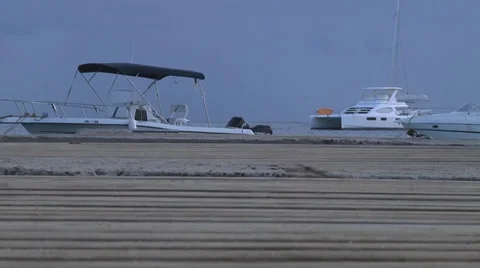 Sailboats floating by dock Видео 33255093