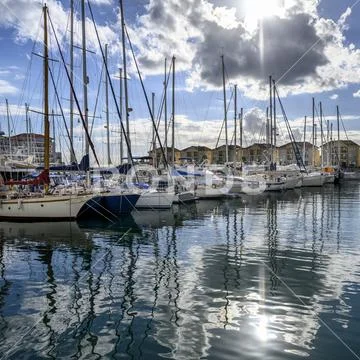 Sailboats moored in a tranquil harbour,Gibraltar Stock Photos