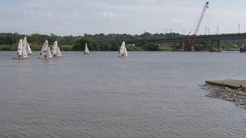 Sailboats on a river 4K Stock Footage 95917688