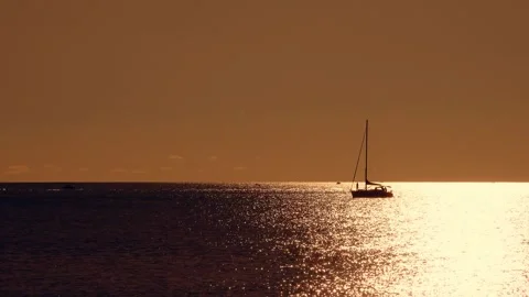 Sailing across the sunset Stock Footage 282233271