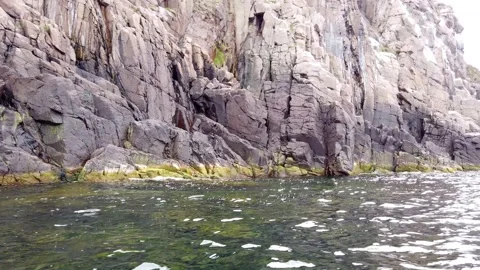 Sailing Along Huge Nordic Cliffs Stock Footage 153473467