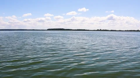 Sailing along the smooth surface of the river on motorboat Stock Footage 280148522