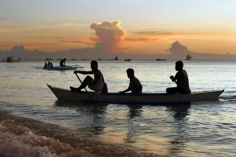 Sailing and sunset Stock Photos