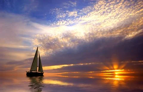 Sailing and sunset Stock Photos