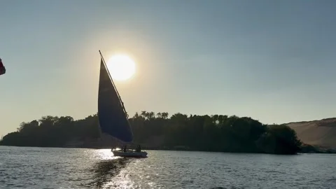 Sailing in Aswan, river Nile, Egypt, Nubia. Sundown.. Stock Footage 313869503