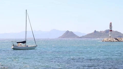 Sailing Boat and Lighthouse Stock Footage 236659776