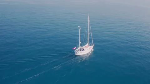 Sailing boat on calm ocean Stock Footage 167553280