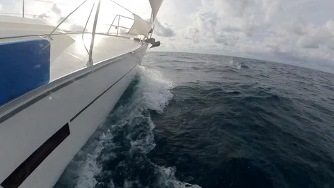Sailing boat, close-up view of the bow while sailing with the waves Stock Footage 120742664