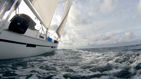 Sailing boat, close-up view of the bow while sailing with the waves Stock Footage 120742670